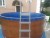Морозоустойчивый бассейн 250х125см Лагуна круглый  цвет дерево, лестница, фильтр насос, скиммер, песок