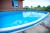 Каркасный бассейн 400х200х125см Larimar морозоустойчивый овальный (вкапываемый), скиммер, фильтр-насос, песок, лестница